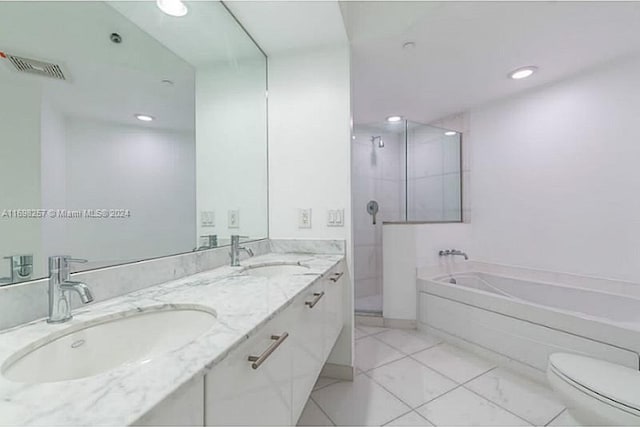 500 Brickell Ave Unit 2910, Miami, FL 33131 - full bathroom with toilet, vanity, and separate shower and tub