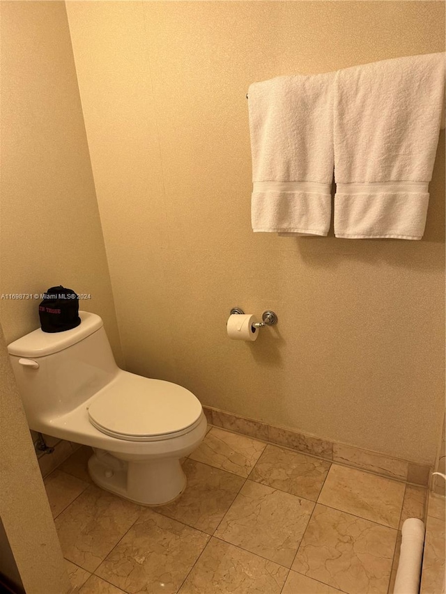 bathroom featuring toilet