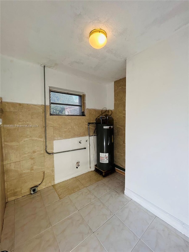 utility room with water heater