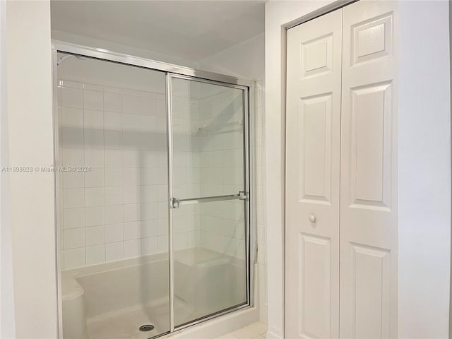 bathroom with an enclosed shower