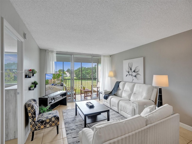 tiled living room with a textured ceiling