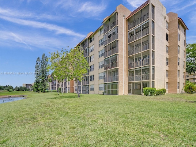 view of property with a water view