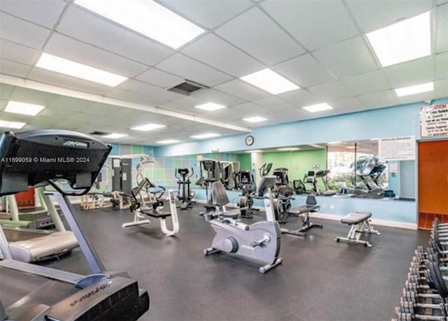 workout area featuring a drop ceiling