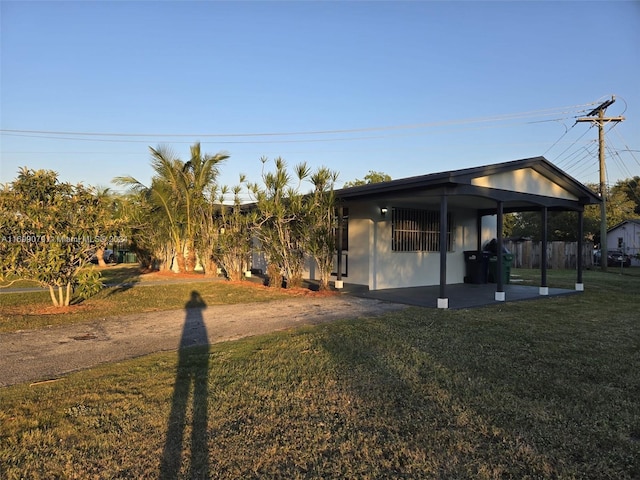 9780 SW 167th St, Miami, FL 33157 - view of grassy yard featuring a patio