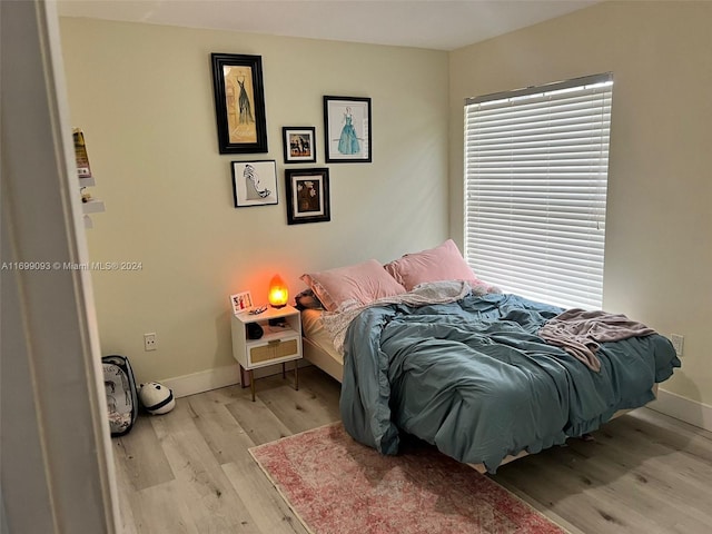 bedroom featuring light hardwood / wood-style floors