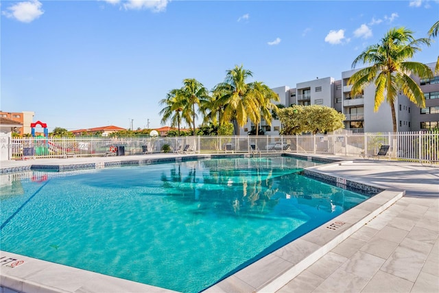 view of swimming pool featuring a patio area