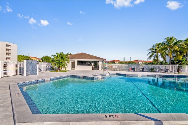 view of pool featuring a patio area