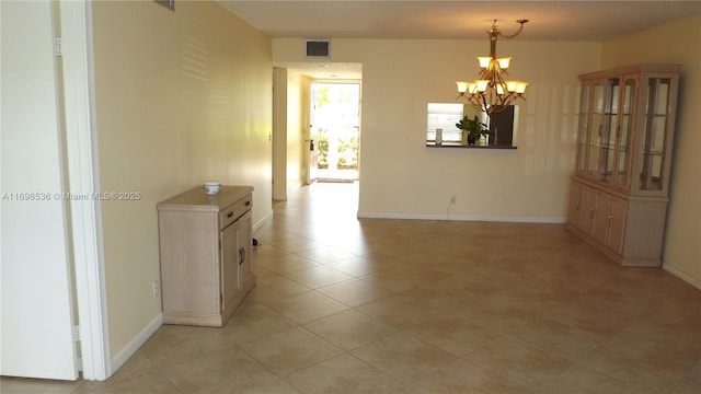 901 SW 128th Ter Unit 103A, Pembroke Pines, FL 33027 - unfurnished dining area featuring a chandelier and baseboards