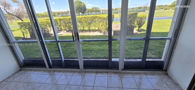 901 SW 128th Ter Unit 103A, Pembroke Pines, FL 33027 - doorway with tile patterned flooring