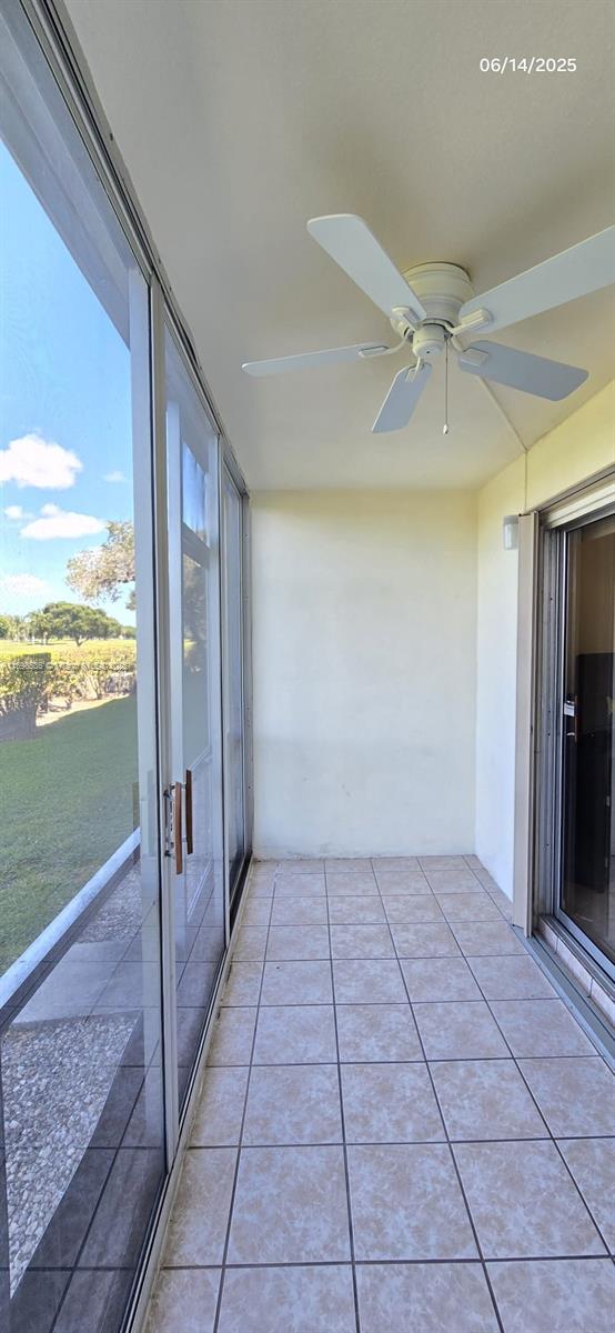 901 SW 128th Ter Unit 103A, Pembroke Pines, FL 33027 - view of unfurnished sunroom