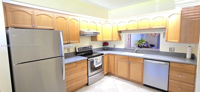 901 SW 128th Ter Unit 103A, Pembroke Pines, FL 33027 - kitchen featuring appliances with stainless steel finishes, under cabinet range hood, and light tile patterned floors