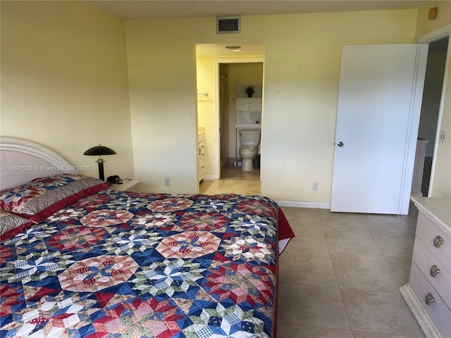901 SW 128th Ter Unit 103A, Pembroke Pines, FL 33027 - bedroom with light tile patterned flooring and ensuite bathroom