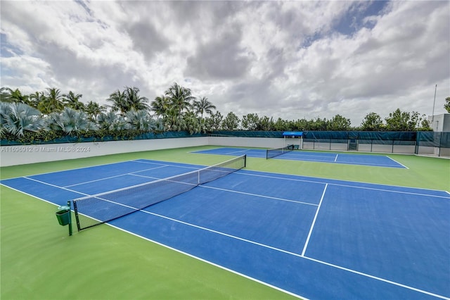 view of tennis court with basketball court