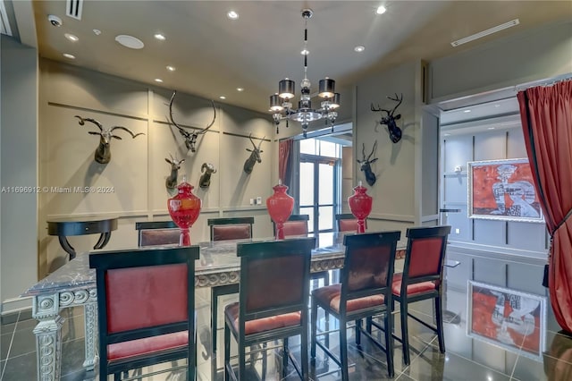 dining area with a notable chandelier