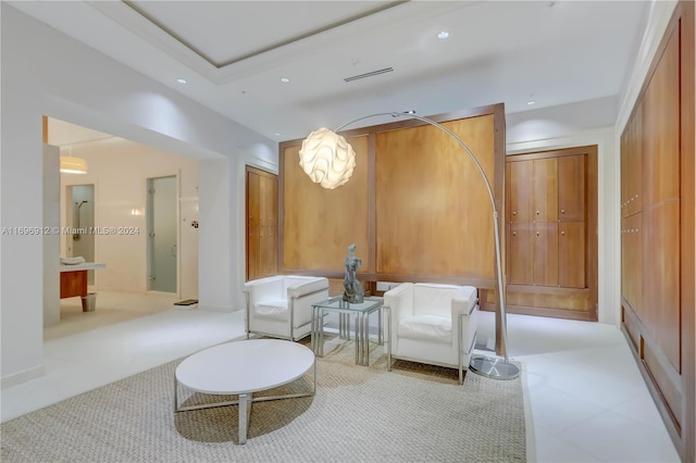 living area featuring light colored carpet