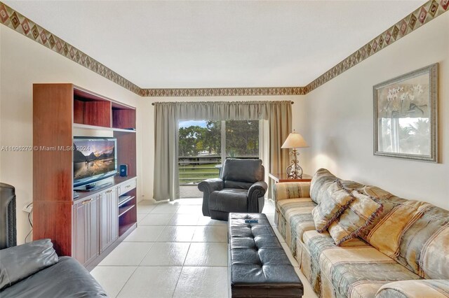 living room with light tile patterned flooring