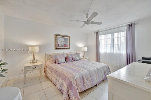 bedroom featuring ceiling fan and light tile patterned floors