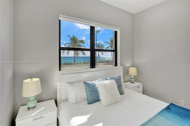 bedroom with a water view