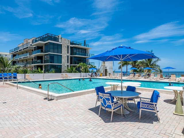 view of pool with a patio