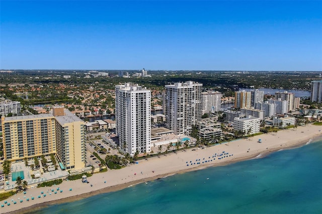 bird's eye view with a view of the beach and a water view