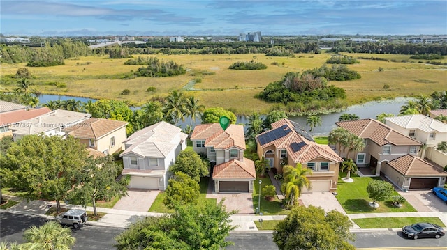 drone / aerial view featuring a water view