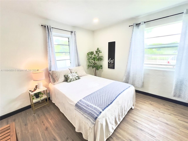 bedroom featuring hardwood / wood-style flooring