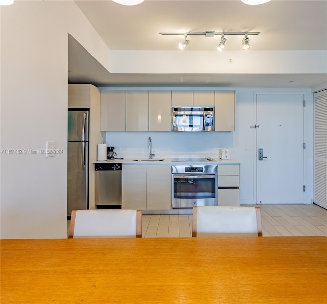 kitchen featuring sink and appliances with stainless steel finishes