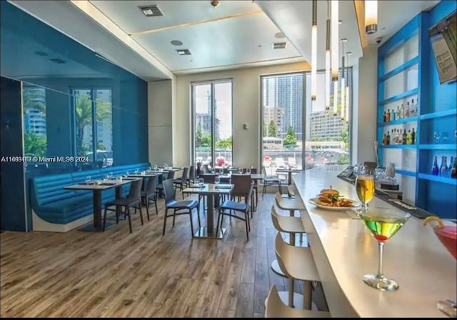 dining room with hardwood / wood-style flooring