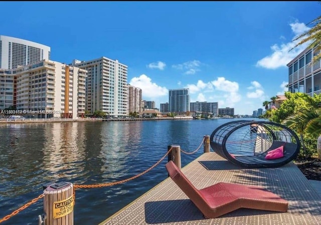 view of dock with a water view