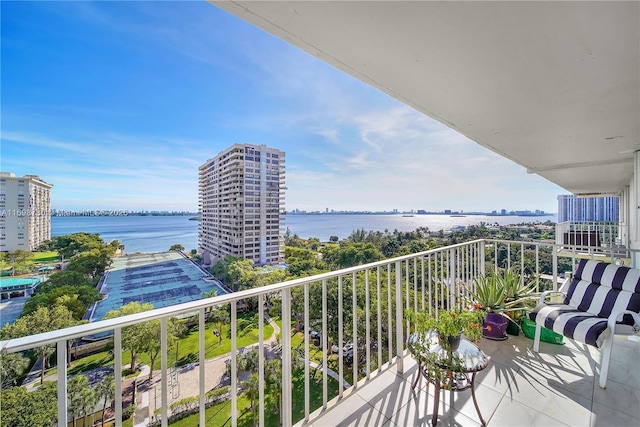 balcony featuring a water view