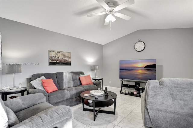 living room with ceiling fan and vaulted ceiling