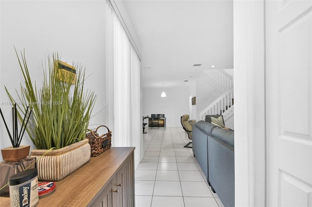 interior space featuring light tile patterned flooring