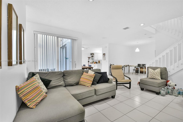 living room with light tile patterned floors