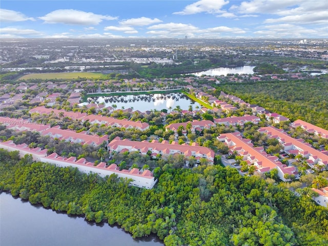 birds eye view of property featuring a water view