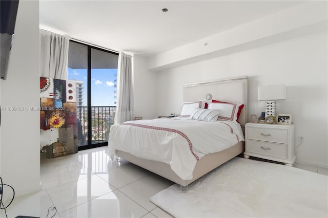 tiled bedroom featuring access to outside and expansive windows