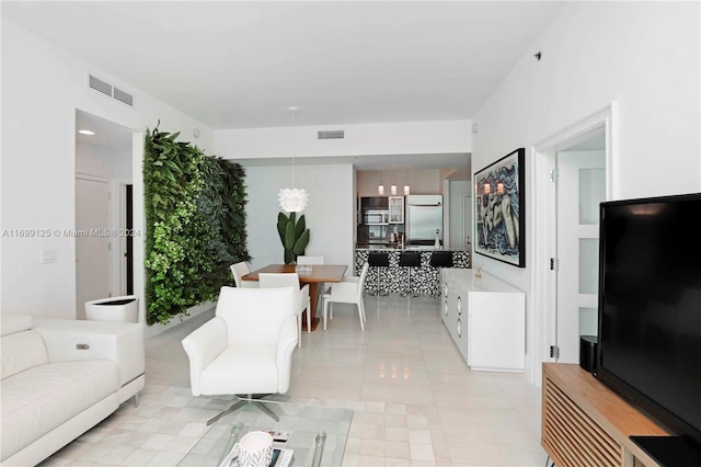 living room featuring light tile patterned floors