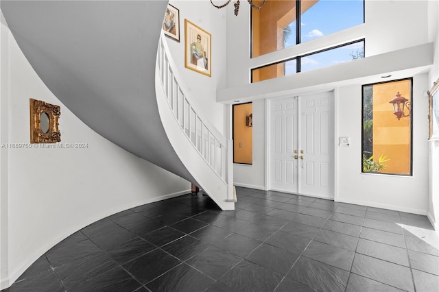 foyer with a high ceiling