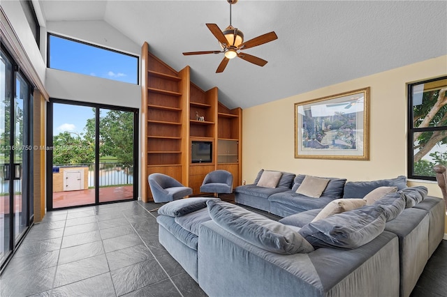 living room featuring ceiling fan, built in features, a textured ceiling, and high vaulted ceiling