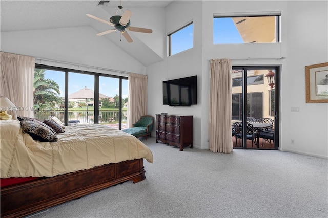 bedroom featuring ceiling fan, access to exterior, carpet floors, and high vaulted ceiling