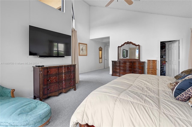 bedroom featuring ceiling fan, light carpet, and high vaulted ceiling