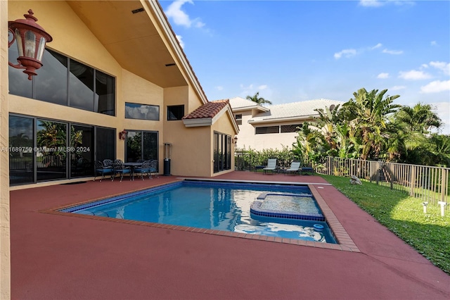 view of swimming pool featuring a patio area