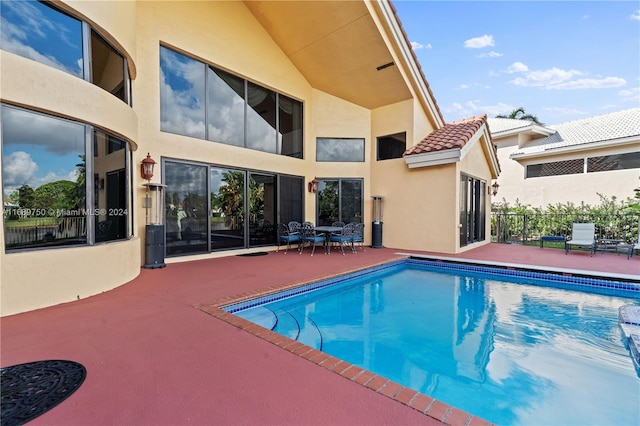 view of swimming pool featuring a patio