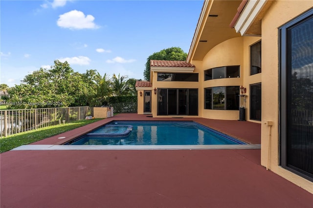 view of pool with a water view