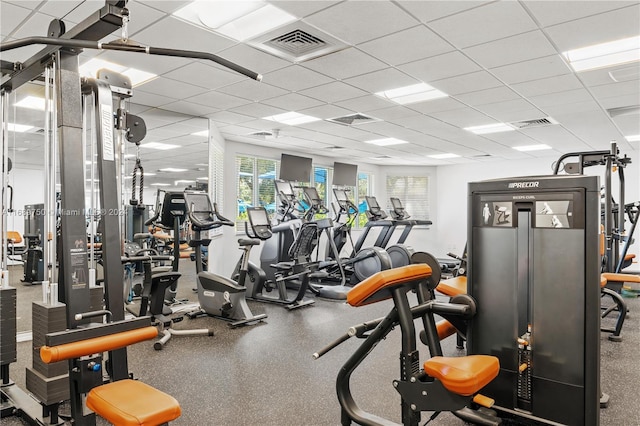 exercise room with a drop ceiling