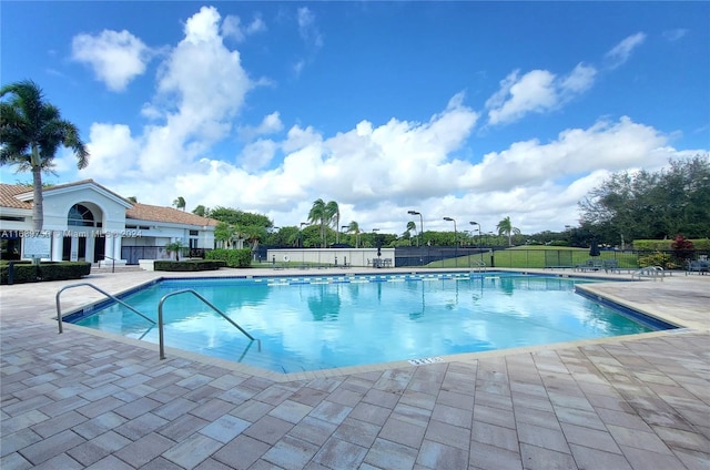 view of pool with a patio