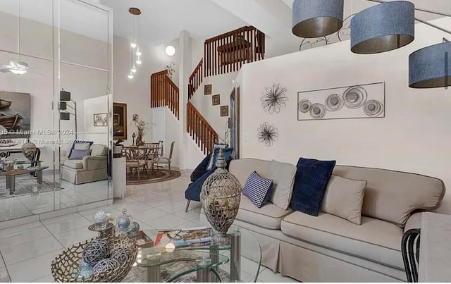 living room featuring a towering ceiling