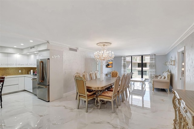 dining area with a notable chandelier and ornamental molding