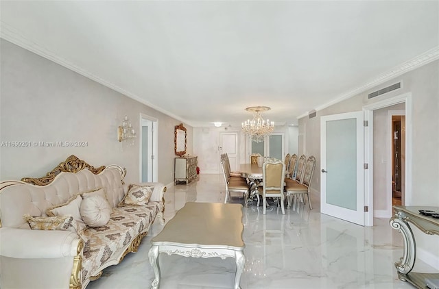 living room featuring a chandelier and crown molding