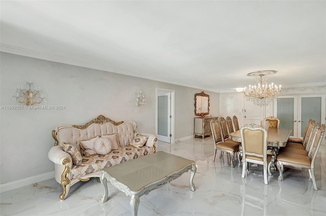 dining space featuring a chandelier and french doors