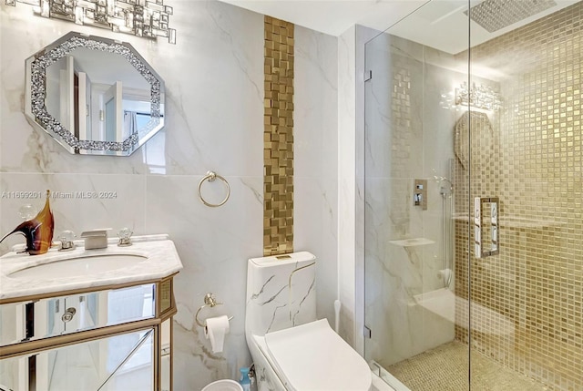 bathroom with vanity, backsplash, toilet, tile walls, and a shower with shower door